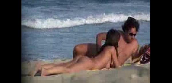  Nudist couple secretly filmed at the beach
